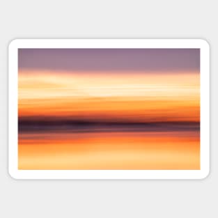 Abstract coastal theme using long exposure for intense color background with orange hue Sticker